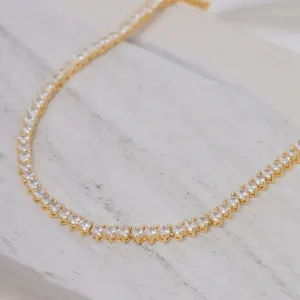 COLAR RIVIERA COM ZIRCÔNIAS REDONDAS CRISTAIS BANHO OURO 18K