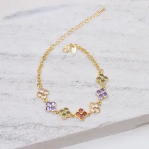 PULSEIRA FLOR CRAVEJADA COM ZIRCÔNIAS COLORIDAS BANHO OURO 18K