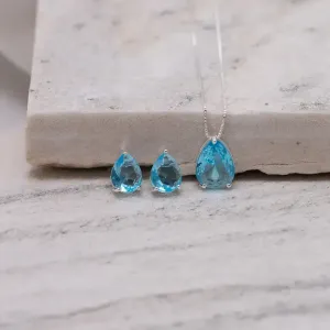 CONJUNTO GOTA COM PEDRA AZUL CLARO BANHO PRATA