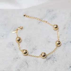 PULSEIRA BOLINHAS LISAS M BANHO OURO 18K