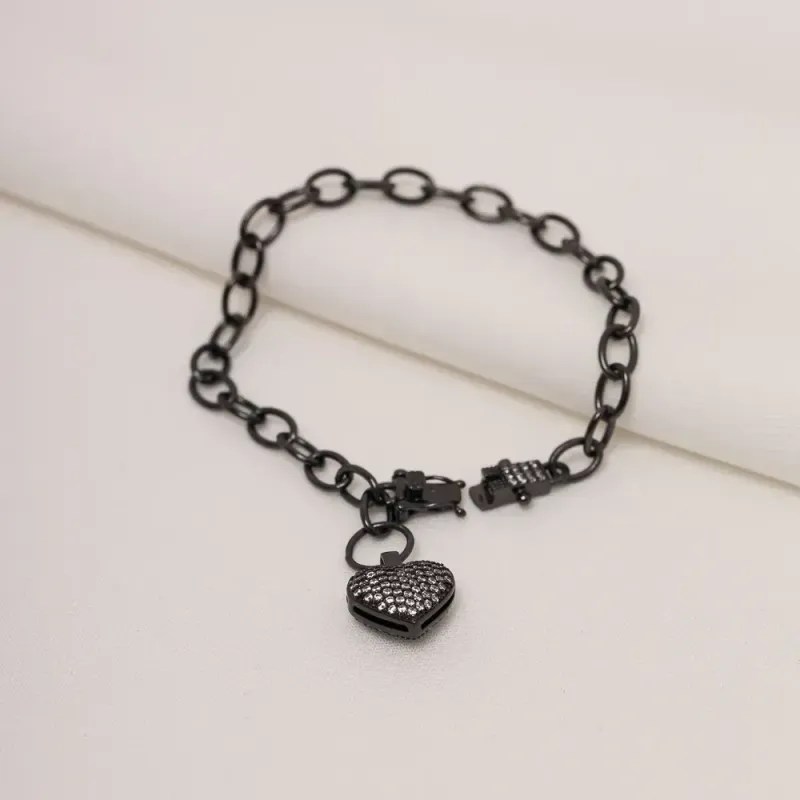 PULSEIRA CORAÇÃO CRAVEJADA COM ZIRCÔNIAS BANHO RÓDIO NEGRO