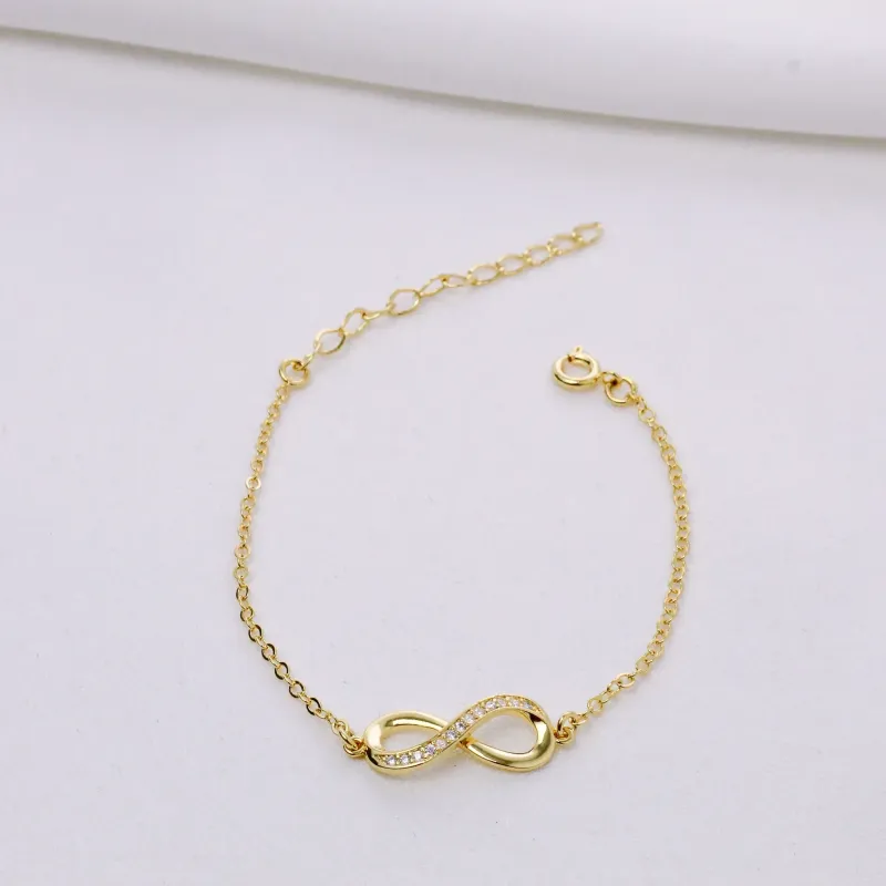 PULSEIRA INFINITE COM ZIRCÔNIAS CRISTAIS BANHO OURO 18K