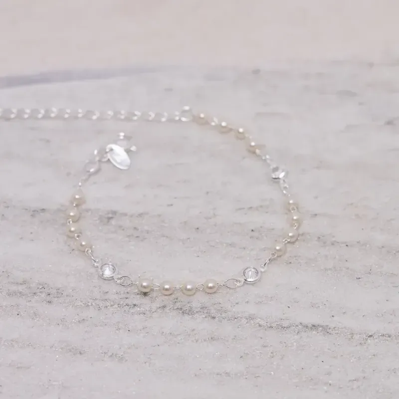 PULSEIRA PÉROLAS COM ZIRCÔNIAS BANHO PRATA