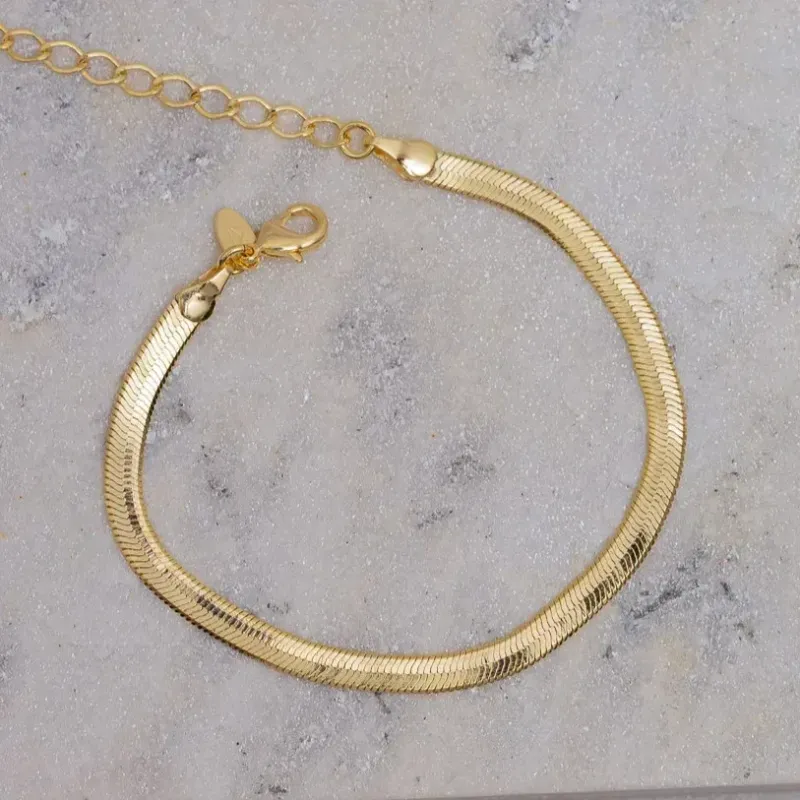 PULSEIRA FITA ESPELHADA M BANHO OURO 18K