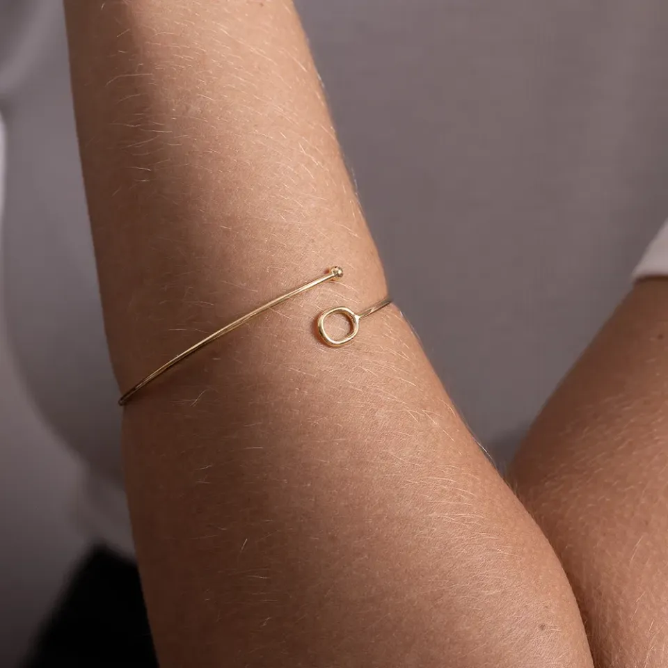 BRACELETE ABERTO COM CÍRCULO BANHO OURO 18K