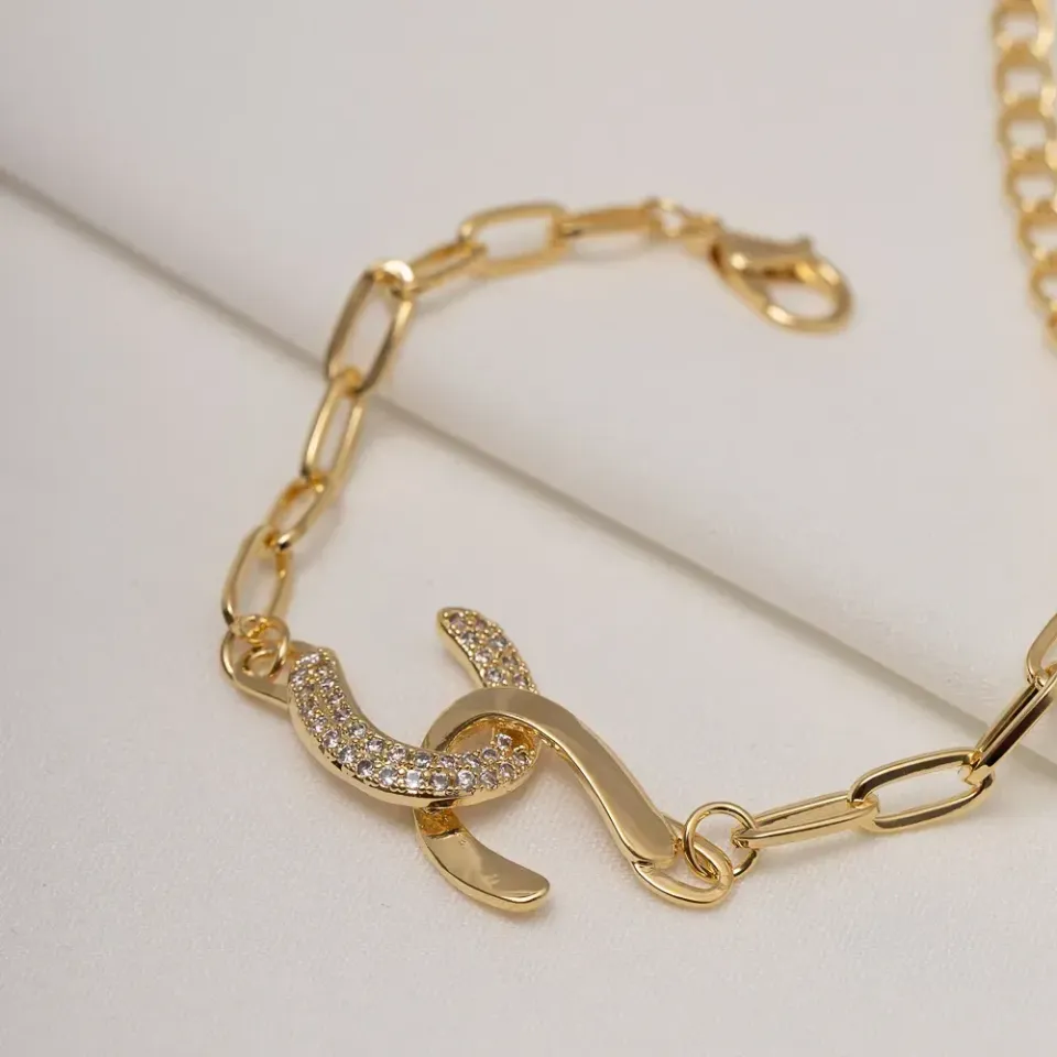 PULSEIRA INFINITE ELOS CARTIER CRAVEJADA COM ZIRCÔNIAS CRISTAIS BANHO OURO 18K