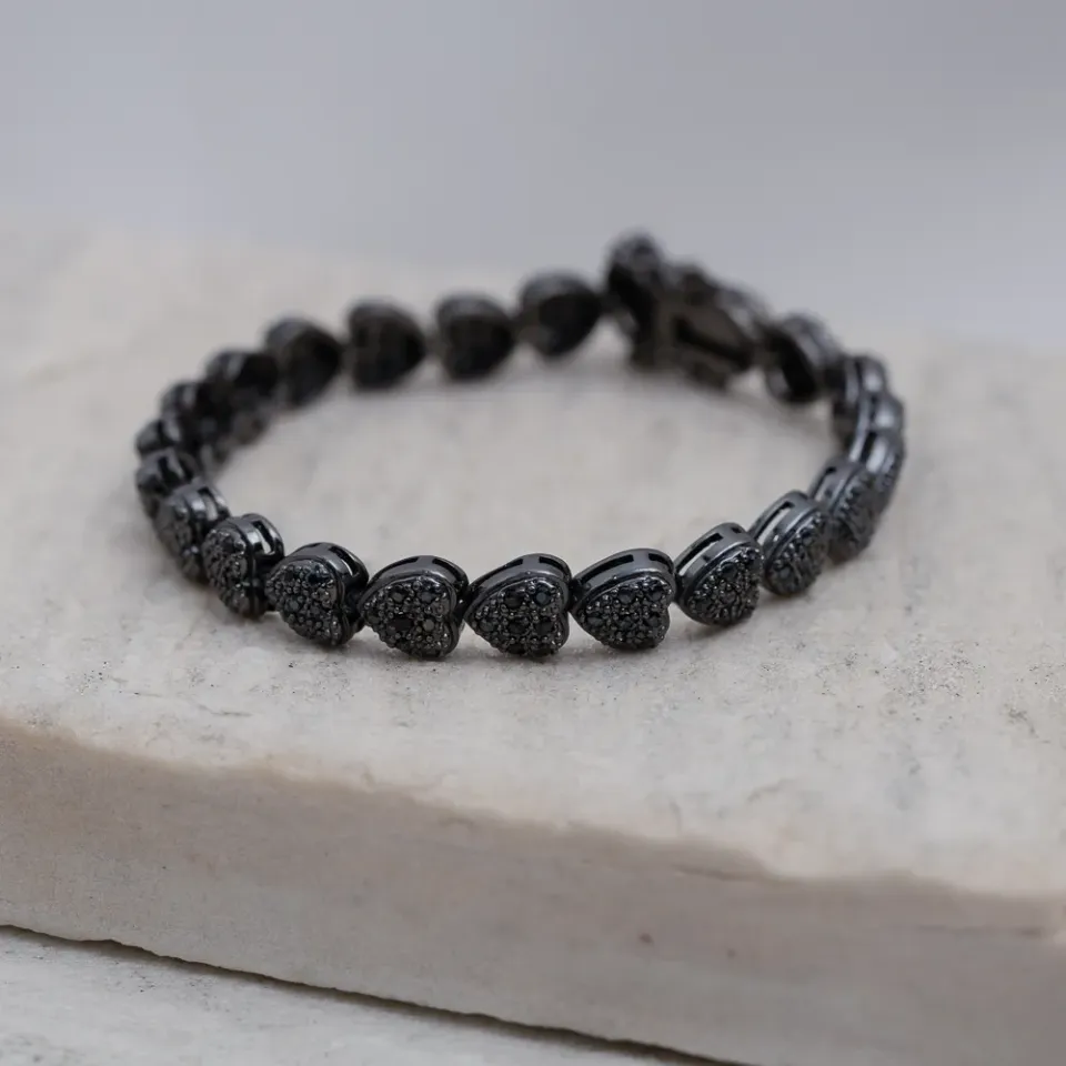 PULSEIRA CORAÇÃO CRAVEJADO COM ZIRCÔNIAS NEGRAS BANHO RÓDIO NEGRO