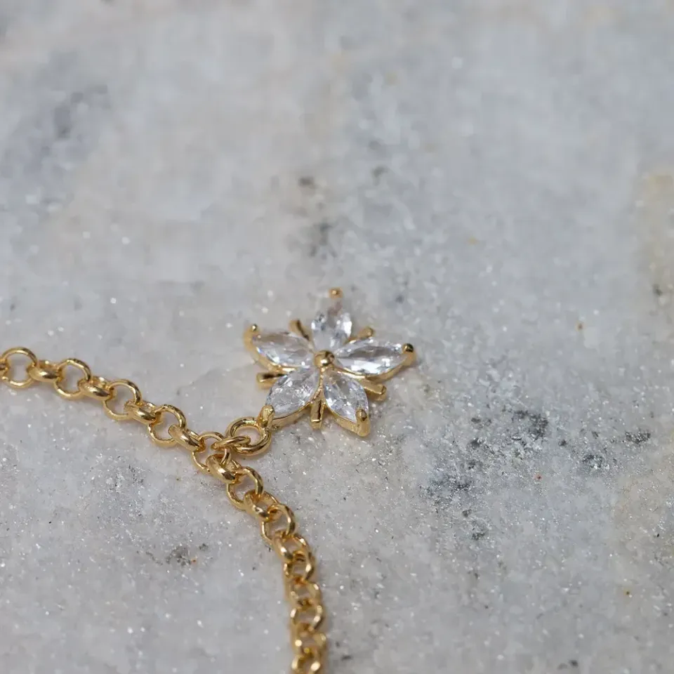 PULSEIRA ELO PORTUGUÊS COM FLOR CRISTAL BANHO OURO 18K